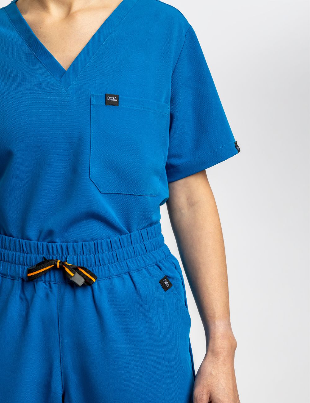 Female blue scrub top– Cosa Workwear