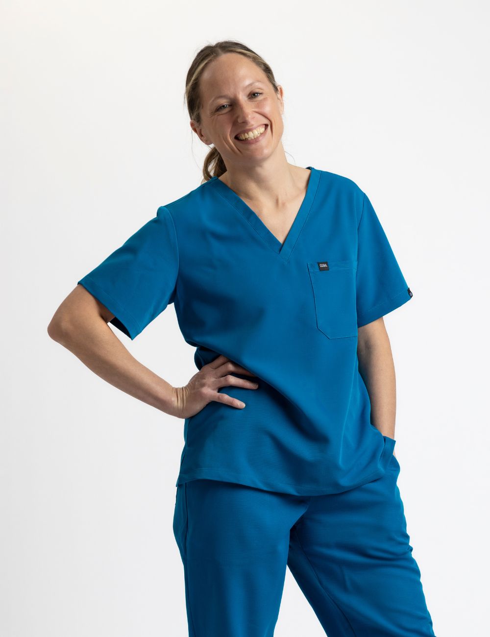 Female blue scrub top – Cosa Workwear